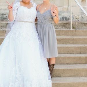 Grey David’s bridal dress with back straps.